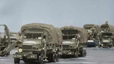 One or two trucks sank 
in bomb craters. - Greatest Events of World War II in Colour