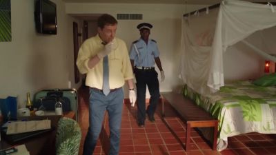 Only one glass -
suggests she didn't have company. - Death in Paradise