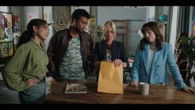 -Or an envelope with a single
copy of a newspaper article. - True Justice: Family Ties