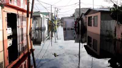 Our community, La Perla,
which got hit very hard, - Down to Earth with Zac Efron