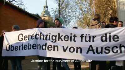 Our friends put up the banner - The Accountant of Auschwitz