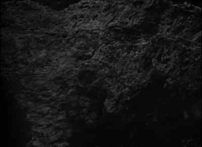 Over there, capping the rock. - Lord of the Flies
