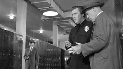 Packy Reed figured right. - Shield for Murder