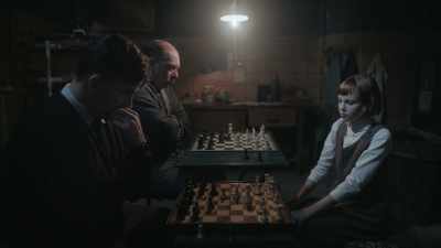 [paper crinkles] - The Queen's Gambit