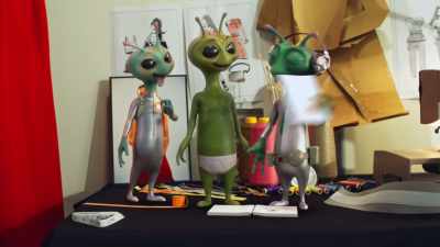 - [paper shredding]
- [eager babbling] - Alien TV