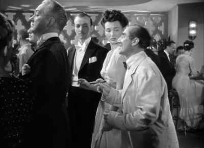 Pardon me. Did you drop this? - A Night in Casablanca