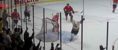 Penguins slip it back
behind the Chicago goal. - Sudden Death