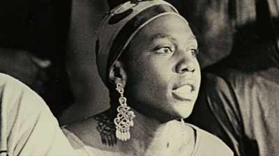 [people chanting]
Power to the people! - Dear Mama