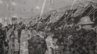 People standing outside, - Billy Graham: An Extraordinary Journey