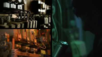 Phil and Amil finally
find the junction box - History's Greatest Heists with Pierce Brosnan