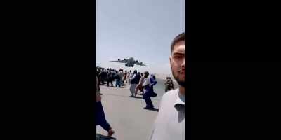 [plane engine roaring] - Escape from Kabul