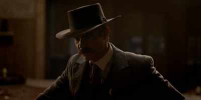 Planning to run telephone
wires across Utter's property. - Deadwood: The Movie