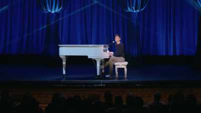- [playing off-key]
- [audience laughs] - Tig Notaro: Hello Again