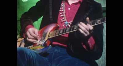 [plays guitar slowly] - Eric Clapton: Life in 12 Bars
