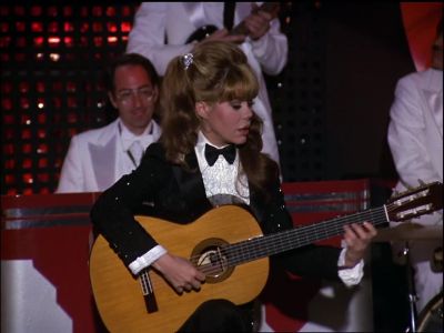 [Plays guitar] - The Love Boat