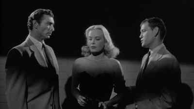 - Please let me go.
- We can't do that, Miss Lowell. - The Big Combo