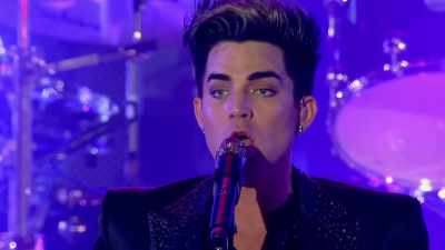 Please welcome Queen
featuring Adam Lambert. - The Show Must Go On: The Queen + Adam Lambert Story