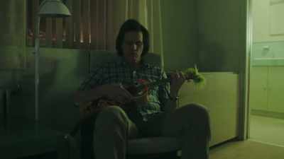 [plucking strings] - Kidding