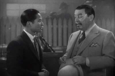 Pocketbook of course left in other suit - Charlie Chan in Shanghai