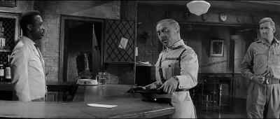 Pour me a whisky,
will you please, Corporal Abou. - Guns at Batasi