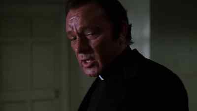 Praying. Have you tried praying? - Exorcist II: The Heretic
