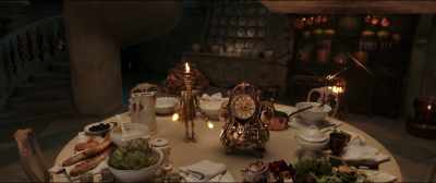 Preparing a dinner, designing
a gown for her, giving her... - Beauty and the Beast