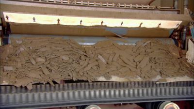 Pressure rollers squeeze
the remaining water - How It's Made