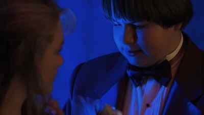 PRINCIPAL: Settle down, people.
Please? Settle down now. - Angus