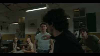 - [prisoners shouting]
- Right, ciúnas. - Say Nothing