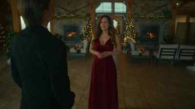 -Probably at home
patting herself on the back - A Novel Christmas