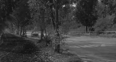 'Proceeding south with Dr. Chet Walker
in yellow convertible. - Creature with the Atom Brain