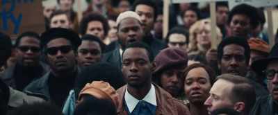 [protesters booing] - Judas and the Black Messiah