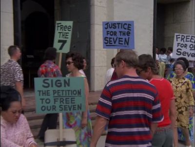 [ PROTESTERS CHANTING
"FREEDOM FOR OUR SEVEN" ] - Hawaii Five-0