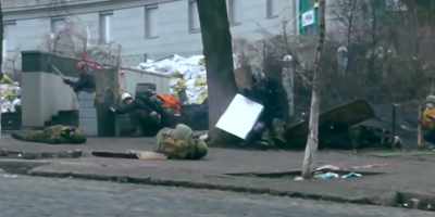 Protesters confronting
security services, - Superpower