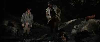 Pull his boots off. - The Last Hard Men