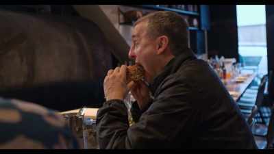 Pulled pork, slaw, cheddar cheese,
on a black sesame roll, - Somebody Feed Phil