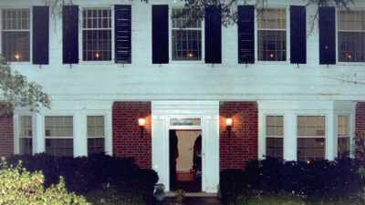 PULLS HER HANDS
DOWN FROM HER HEAD, - An American Murder Mystery: The Staircase