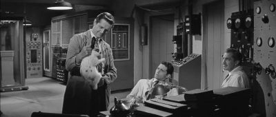 Put a guinea pig in the disintegrator cabinet will you Alan - Return of the Fly