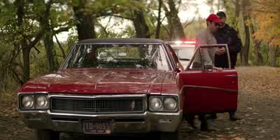 Put your hands on the Buick, sir. - You