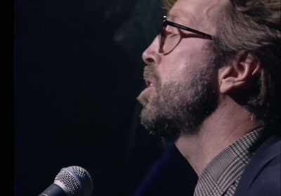 Putting aside
his electric guitar, - Eric Clapton Unplugged… Over 30 Years Later