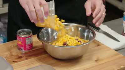Putting in some corn.
I'm just putting in
all the stuff - No Recipe Road Trip With the Try Guys