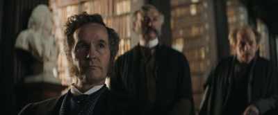 Qualifications come to mind.
Perhaps a Bachelor's Degree. - The Professor and the Madman