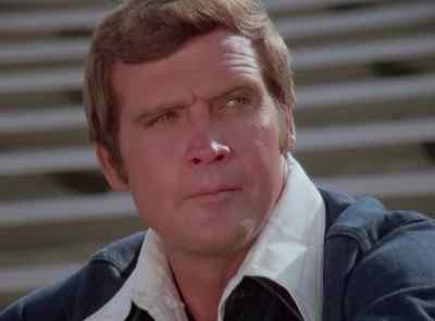 QUARTERBACK:
Purple! On 4, 98! Set! Hut! - The Six Million Dollar Man