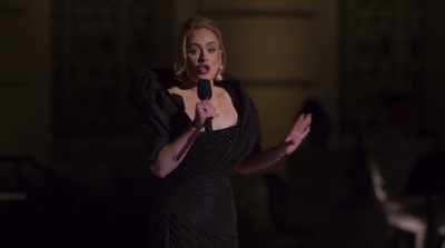 Quentin told Ashley that he's
planned a small surprise to - Adele One Night Only