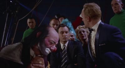 Quick get the spot off her and send the clowns in - Circus of Horrors