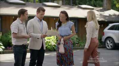 Rachel, presumably
paying for her bill, - Signed, Sealed, Delivered: The Road Less Traveled