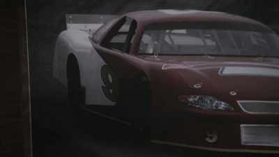 Racing car --
number 9 on his desk, - Reef Break