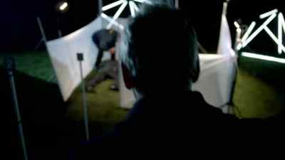 (RADIO CHATTER, CAMERA SHUTTERS CLICK) - Wallander