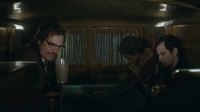 [Radio playing indistinctly] - The Little Drummer Girl