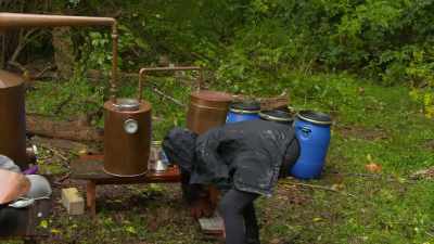   Rain is hitting the helmet
  and the thumper, - Moonshiners: Master Distiller